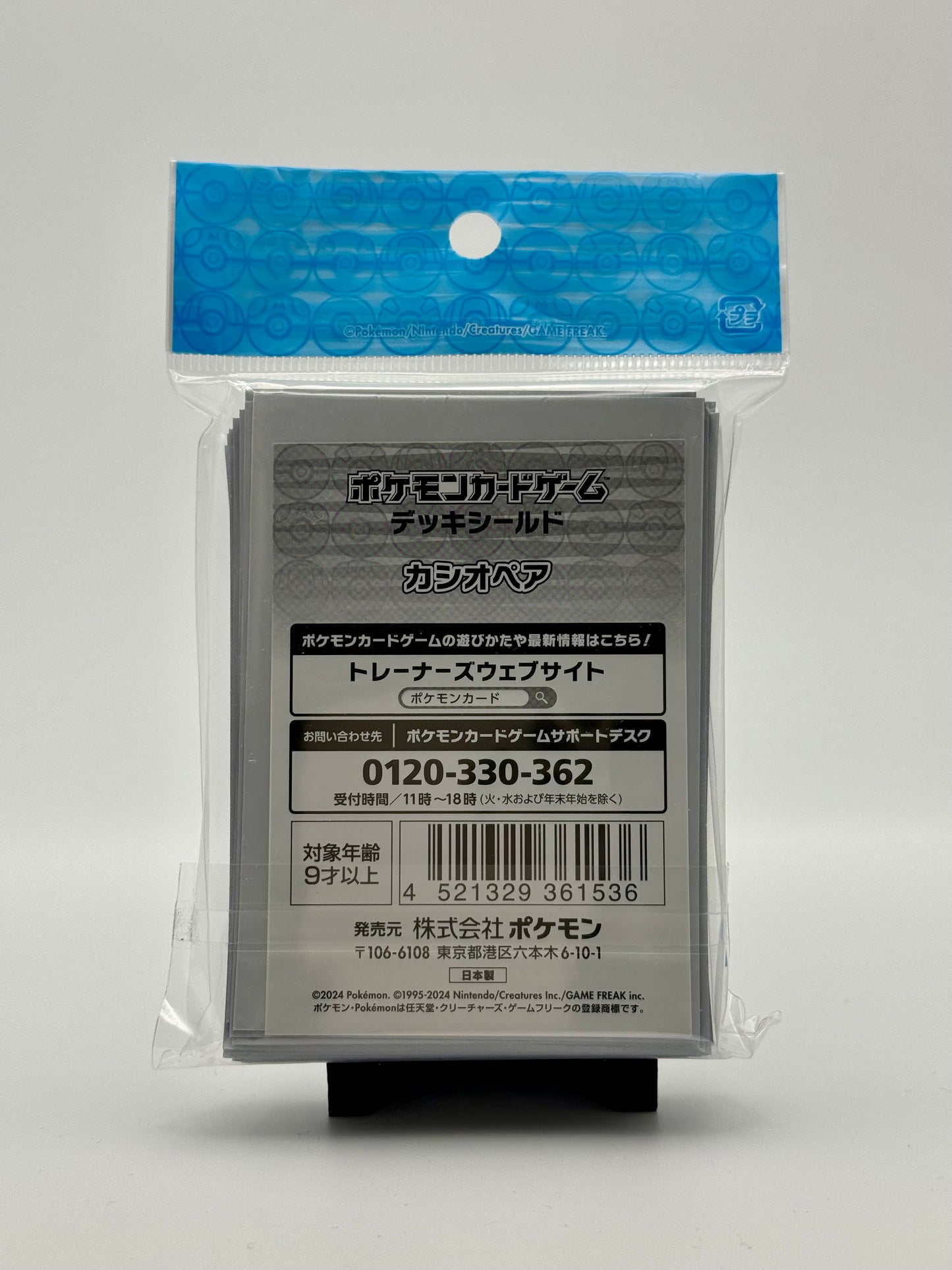 Eevolvd Cassiopeia Pokemon Center Kort sleeve med exklusiv konst med exempel på konsten med bak sidan i fokus direkt fran Pokemon Center Japan