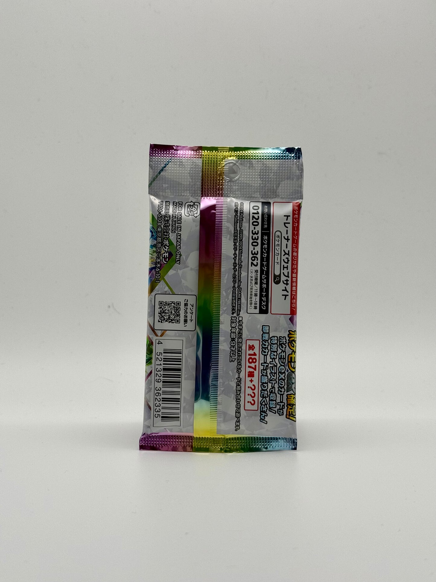 Eevolvd Terresteal Booster Pack med 10 kort som visar bak sidan av paketet direkt fran Pokemon Center Japan