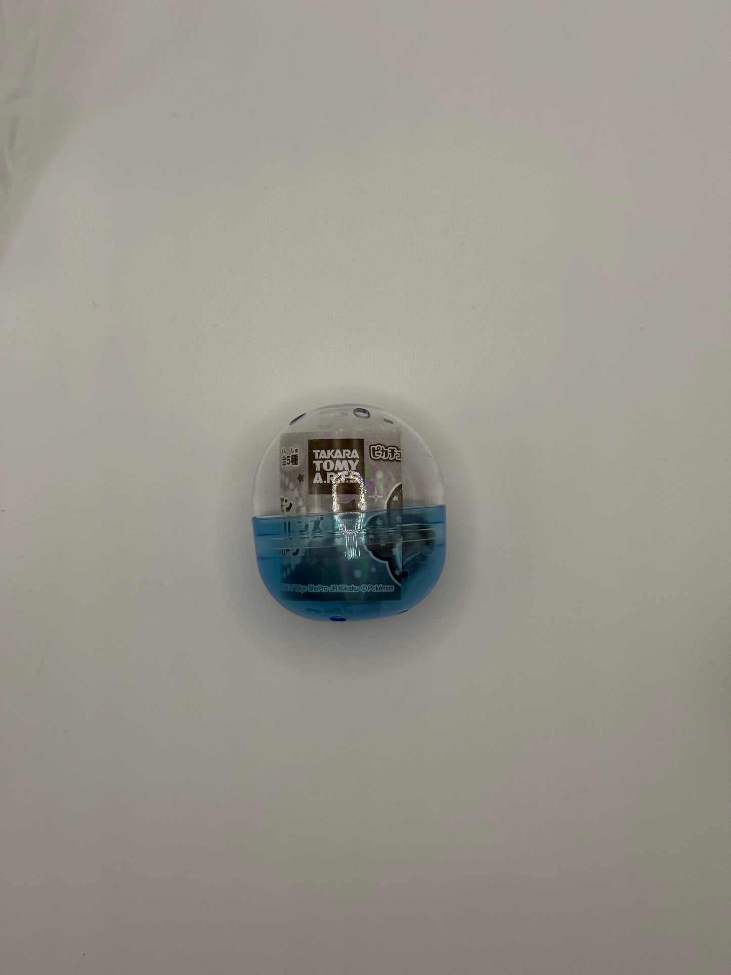 eevolvd pokemon capsule toy with cute pikachu and other irl 1 seen from the front in an example size picture