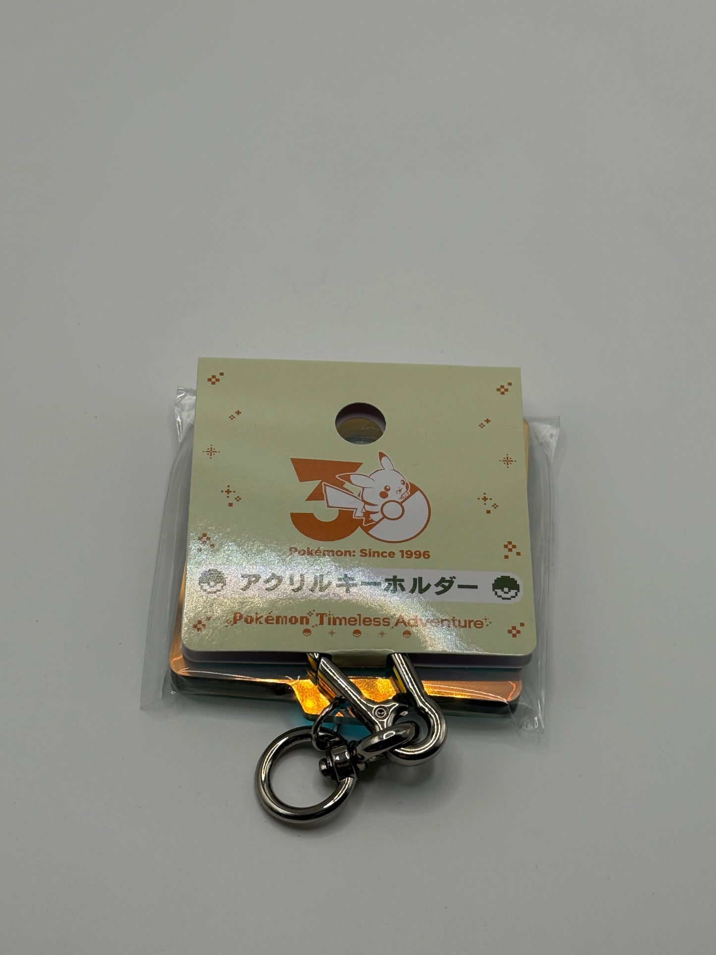 Pokémon Timeless Adventure Nyckelring - 30th Anniversary Edition