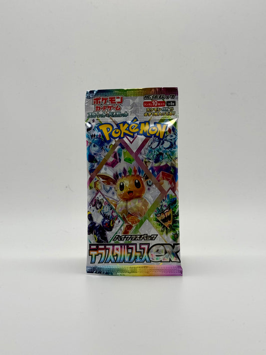 Eevolvd Terresteal Booster Pack med 10 kort som visar framsidan av paketet direkt fran Pokemon Center Japan