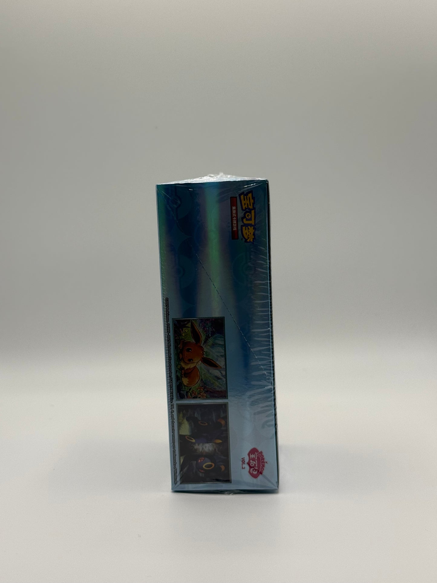 eevolvd gem pack vol 2 booster box med box art sedd fran sidan direkt fran pokemon center kina