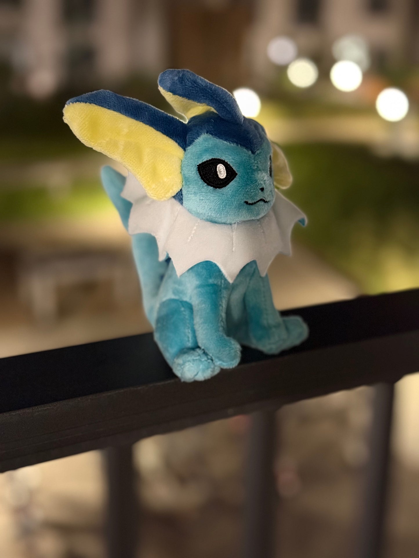 eevolvd vaporeon plush from pokemon center Japan shot at night